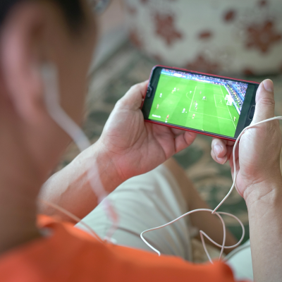 man-watching-football-sport-stream-smartphone-home 1 (2)